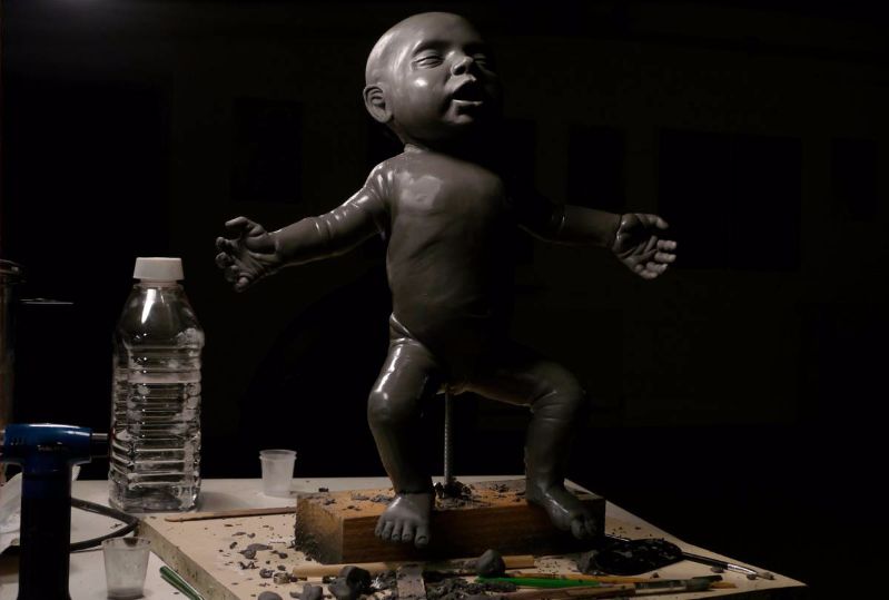 hyper realistic lifesize baby clay sculpture 