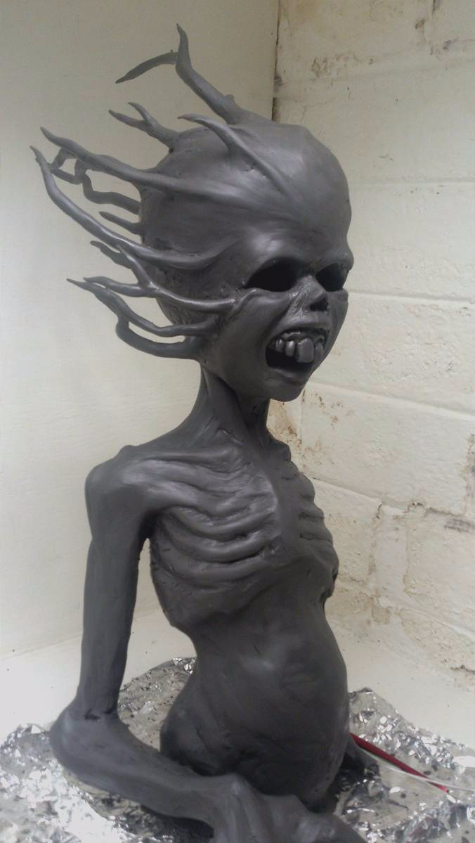 creature concept design clay sculpture
